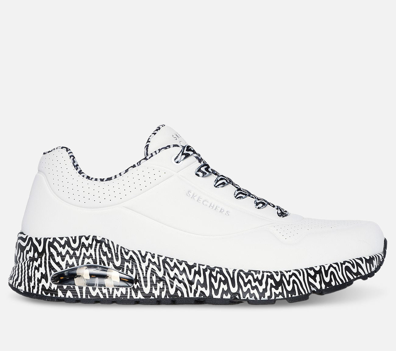 Jen Stark: Uno - Stark Mini Drip Shoe Skechers.fi