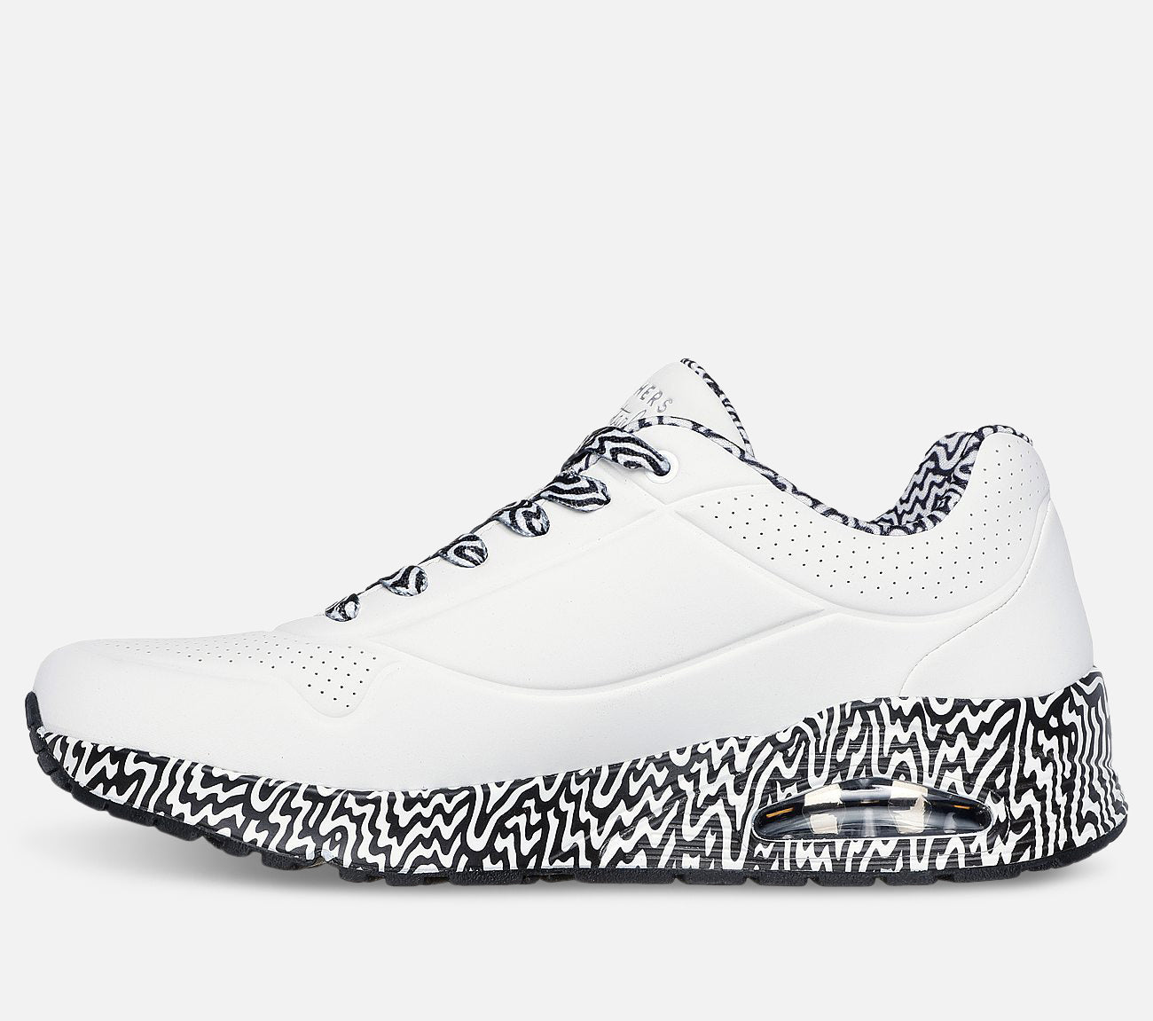 Jen Stark: Uno - Stark Mini Drip Shoe Skechers.fi