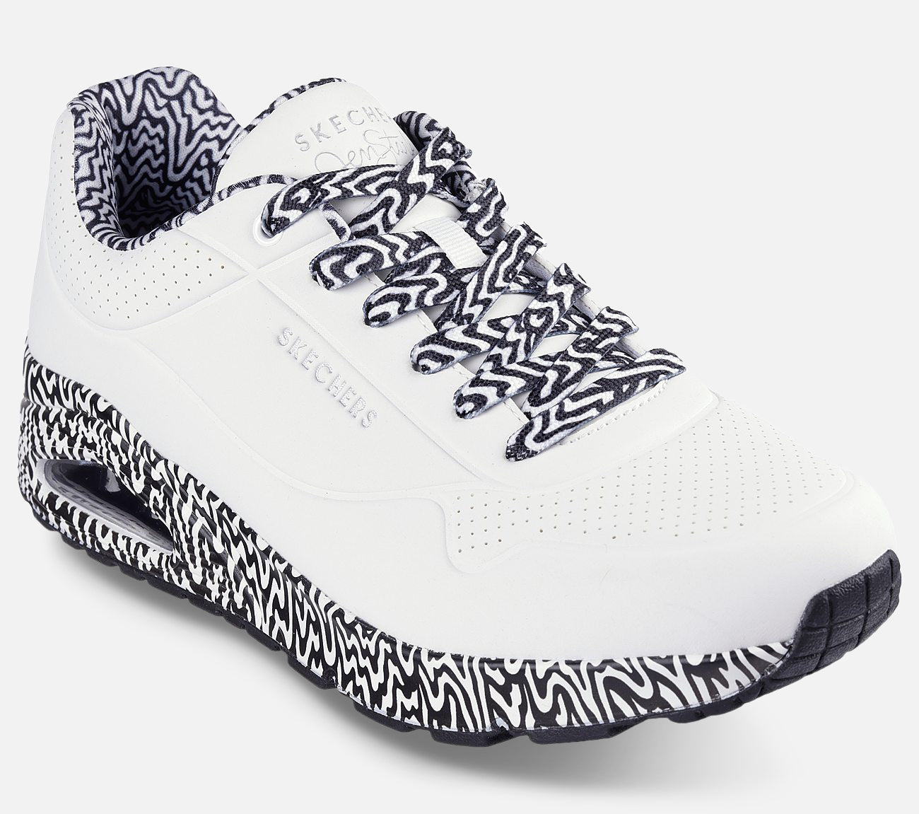 Jen Stark: Uno - Stark Mini Drip Shoe Skechers.fi